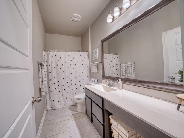 full bath with visible vents, curtained shower, toilet, vanity, and tile patterned flooring