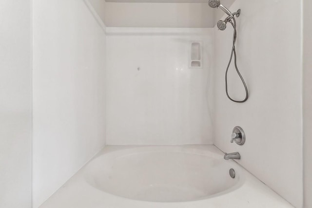 bathroom with shower / bath combination