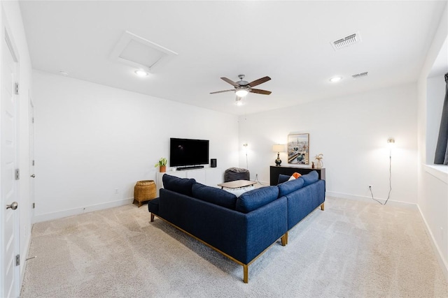 living room featuring light carpet and ceiling fan