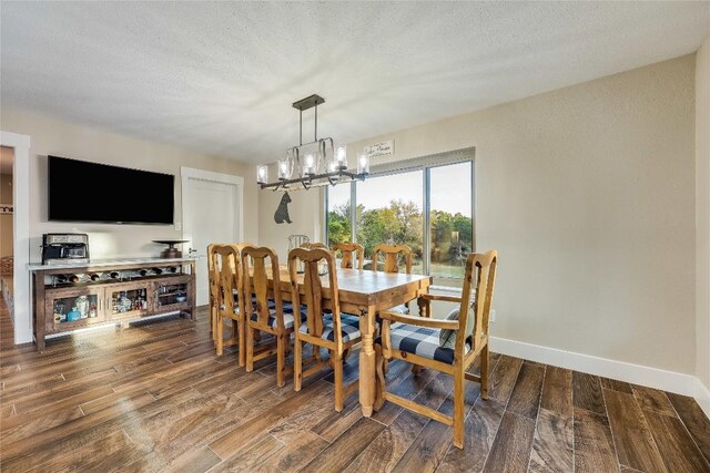 dining room featuring a notable chandelier