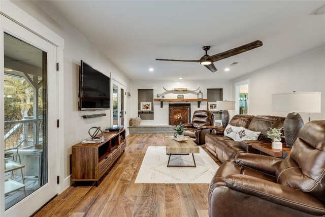 living room with ceiling fan