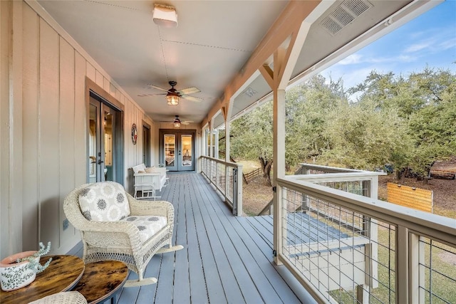 wooden terrace featuring french doors