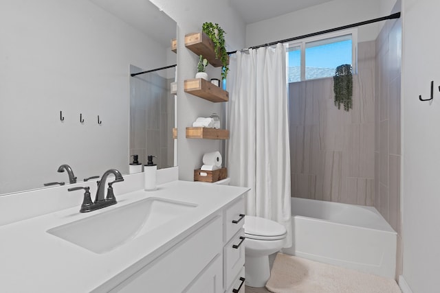 full bathroom featuring toilet, vanity, and shower / bath combo with shower curtain