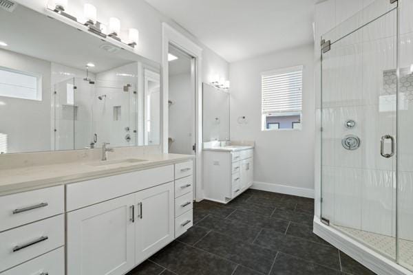 bathroom with vanity and walk in shower