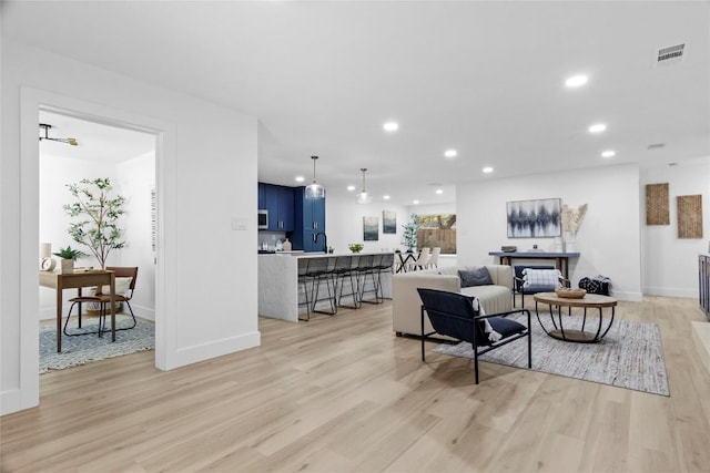 living room featuring light hardwood / wood-style floors