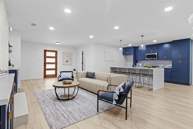 living room featuring light wood-type flooring