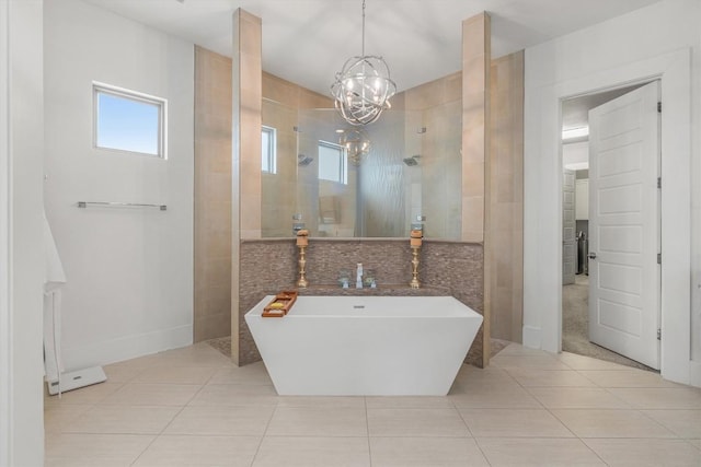 11600 Shoreview Overlook, Austin, TX 78732 - full bathroom with tile patterned flooring, a chandelier, a freestanding tub, and a walk in shower