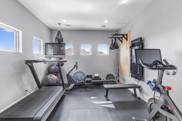 11600 Shoreview Overlook, Austin, TX 78732 - workout room featuring plenty of natural light, baseboards, and recessed lighting