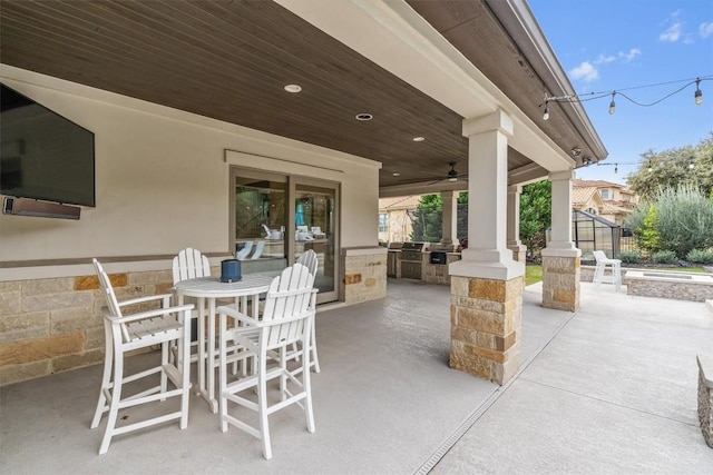 11600 Shoreview Overlook, Austin, TX 78732 - view of patio featuring area for grilling, a fire pit, a ceiling fan, and outdoor dining space