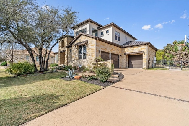 11600 Shoreview Overlook, Austin, TX 78732 - view of front facade featuring stone siding, driveway, a standing seam roof, a metal roof, and a garage