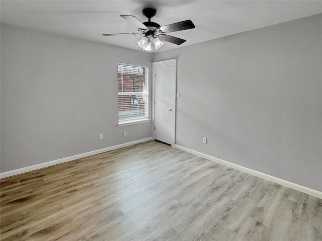 unfurnished room with ceiling fan and light hardwood / wood-style floors