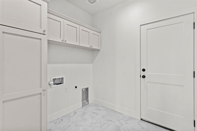 clothes washing area with cabinets, washer hookup, and hookup for an electric dryer