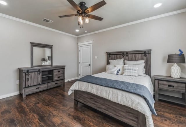 bedroom featuring ceiling fan, dark hardwood / wood-style floors, and ornamental molding