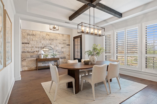 dining space with beamed ceiling, dark hardwood / wood-style floors, and ornamental molding