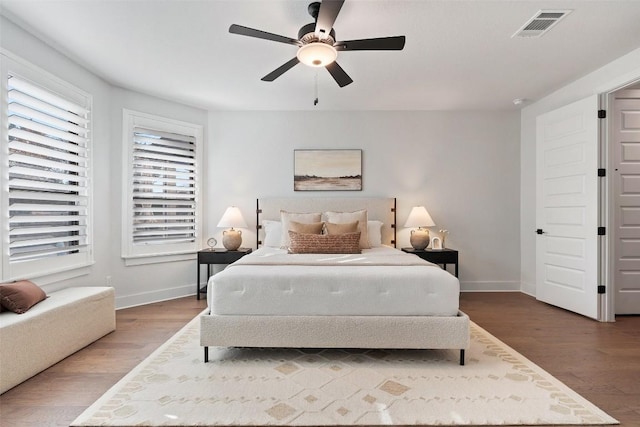 bedroom featuring ceiling fan and hardwood / wood-style flooring