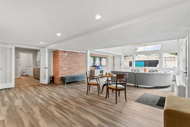 dining area featuring ceiling fan and light hardwood / wood-style floors