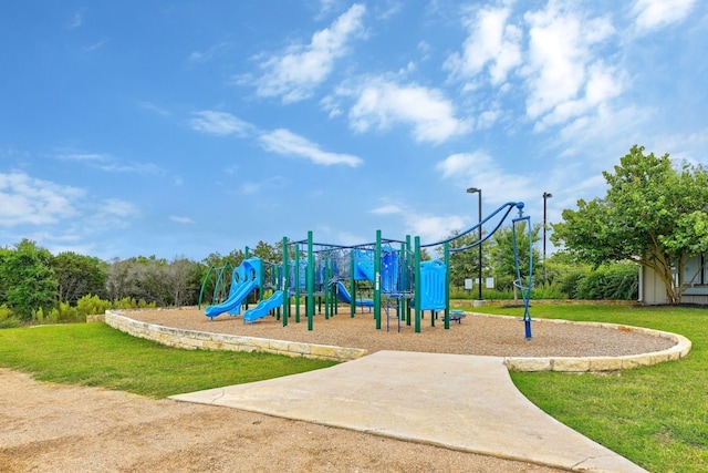 view of jungle gym with a lawn