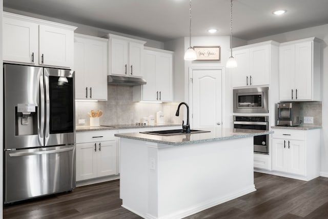 kitchen with stainless steel appliances, white cabinetry, and sink