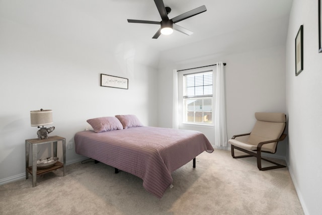 bedroom featuring ceiling fan and light colored carpet