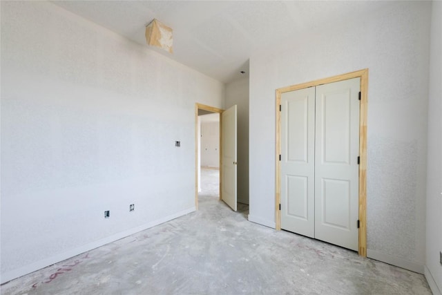 unfurnished bedroom with a closet