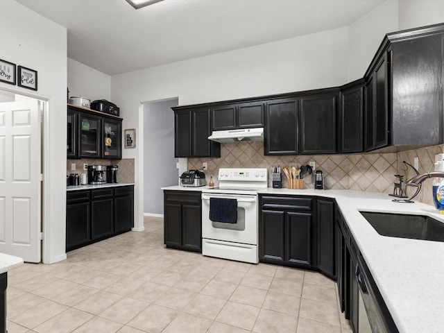 kitchen featuring sink, stainless steel dishwasher, white range with electric stovetop, decorative backsplash, and light tile patterned flooring