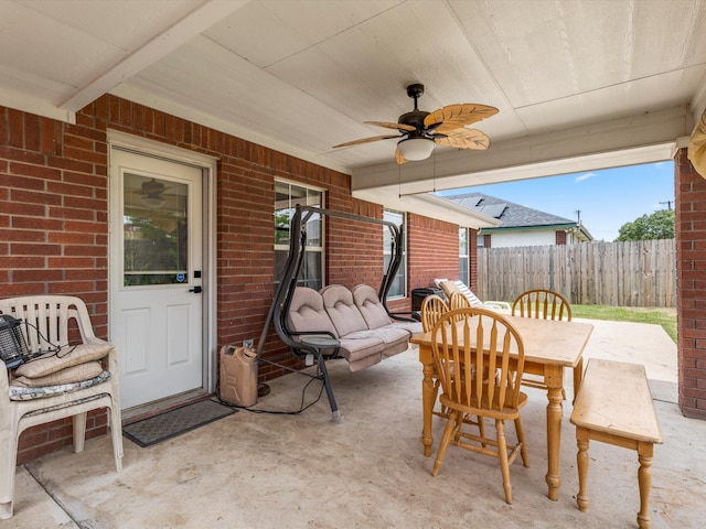 view of patio featuring ceiling fan