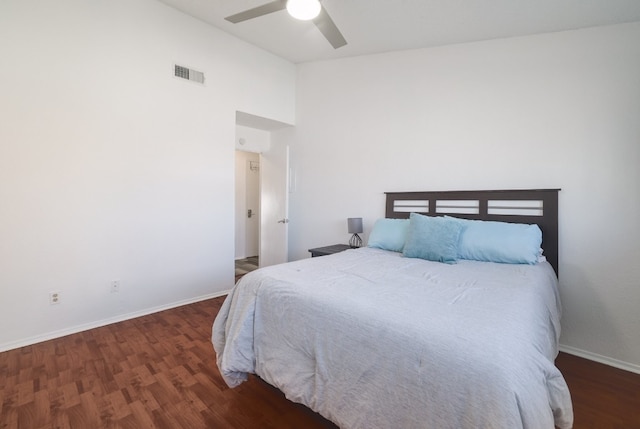 bedroom featuring dark hardwood / wood-style floors and ceiling fan