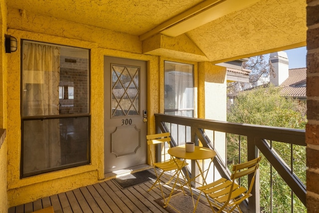 806 W 24th St Unit 300, Austin, TX 78705 - property entrance featuring a balcony and stucco siding