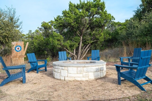 view of patio / terrace with a fire pit