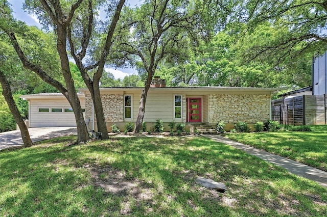 single story home featuring stone siding, a front lawn, and a chimney