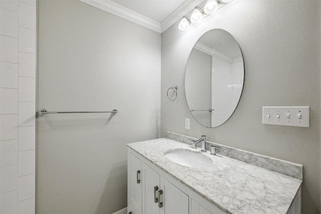 bathroom featuring vanity and ornamental molding