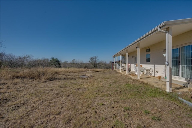 15701 Forest Glenn Cv, Del Valle, TX 78617 - view of yard with a patio area