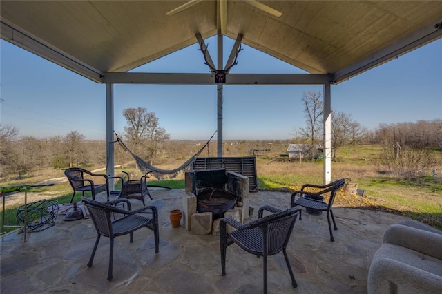 15701 Forest Glenn Cv, Del Valle, TX 78617 - view of patio / terrace with a fire pit