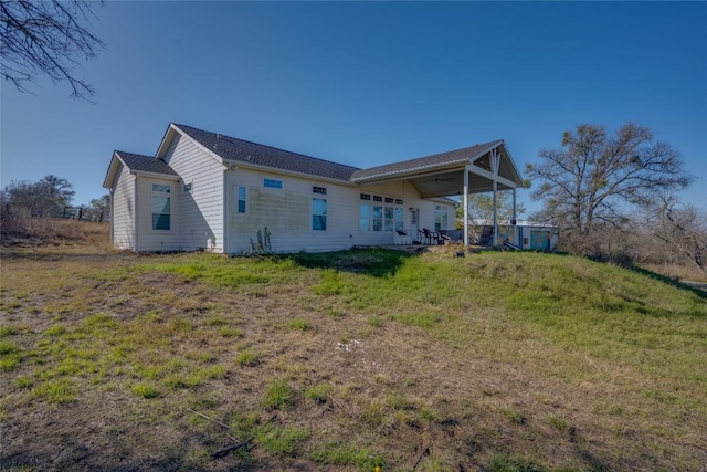 15701 Forest Glenn Cv, Del Valle, TX 78617 - back of property with a yard