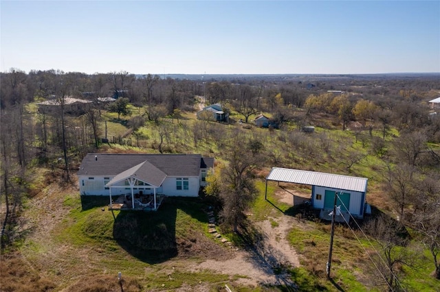 15701 Forest Glenn Cv, Del Valle, TX 78617 - view from above of property featuring a forest