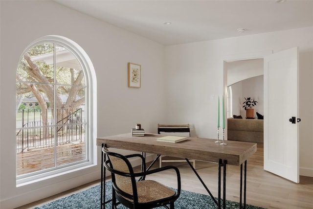 office with light hardwood / wood-style floors