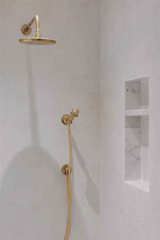 room details with a tile shower