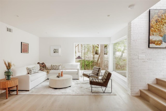 living room with light hardwood / wood-style floors