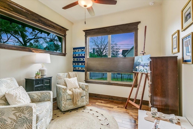 5608 Clay Ave Unit A, Austin, TX 78756 - living area featuring hardwood / wood-style floors, a ceiling fan, and baseboards