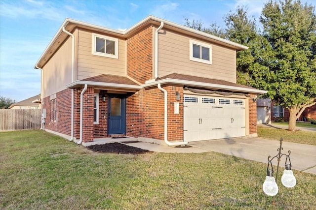 view of front property with a garage and a front yard