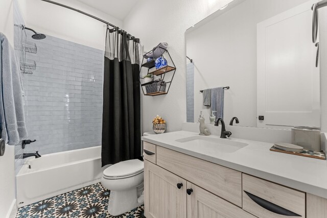 full bathroom featuring shower / bathtub combination with curtain, vanity, and toilet