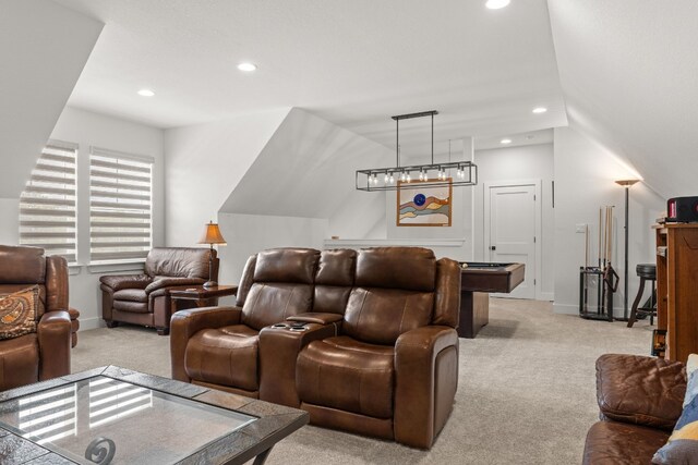 cinema room with recessed lighting, light colored carpet, and baseboards