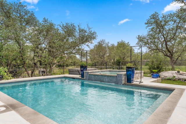 305 Spicewood Trails Dr, Spicewood, TX 78669 - view of swimming pool featuring an in-ground hot tub