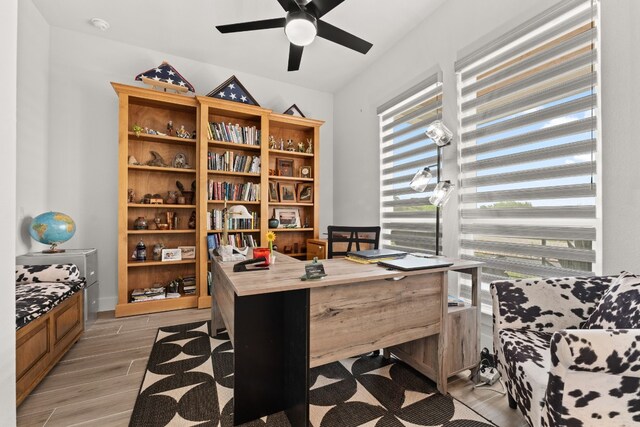 office featuring a ceiling fan and wood finish floors