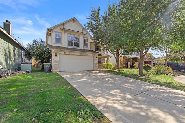 view of front of house featuring a front lawn and a garage