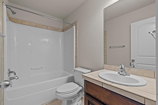 full bathroom featuring tile patterned flooring, vanity, toilet, and shower / washtub combination