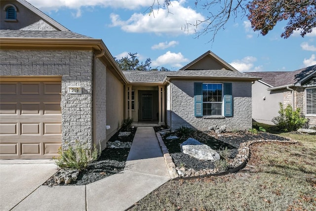 property entrance with a garage