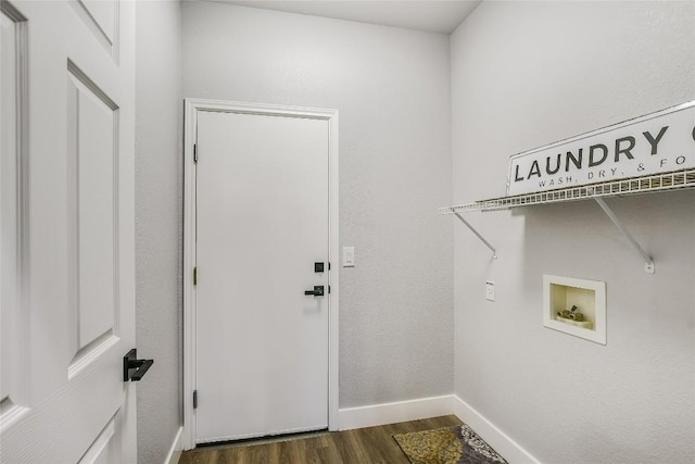 219 Red Poppy Trl, Georgetown, TX 78633 - washroom with washer hookup, dark wood-style flooring, and baseboards