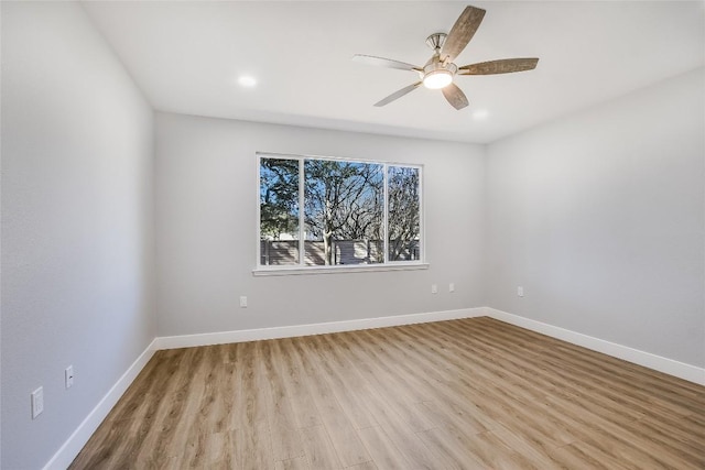 219 Red Poppy Trl, Georgetown, TX 78633 - spare room featuring ceiling fan, wood finished floors, baseboards, and recessed lighting