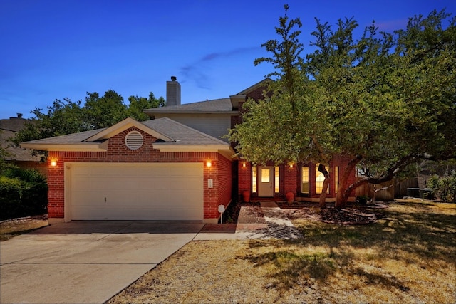 view of front of property featuring a garage